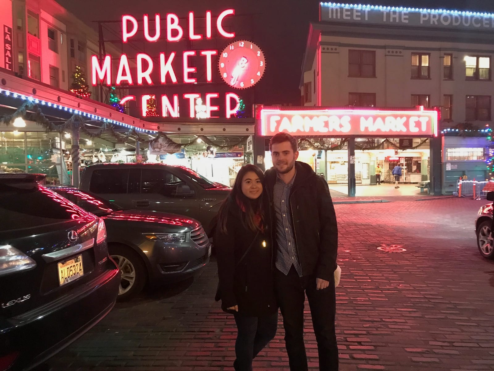 Under the Public Market sign at night